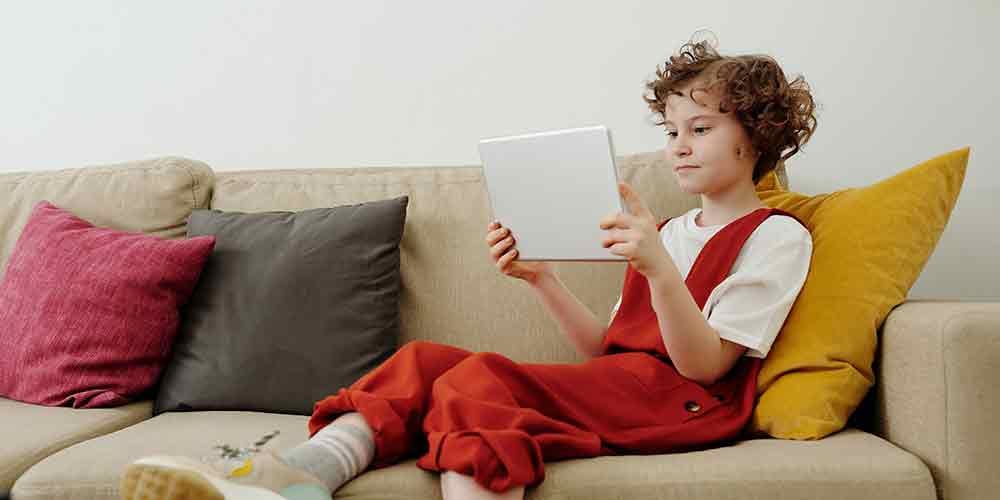 child looking for black friday deals online
