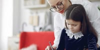 mum homeschooling daughter
