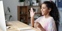girl taking online lesson