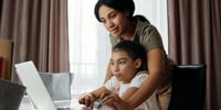 mother and child online tutoring