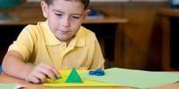 boy learning in class