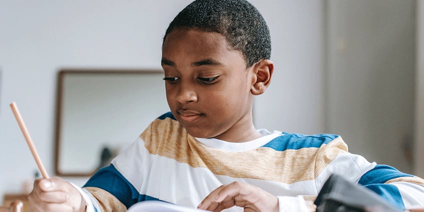 kid_writing_literacy