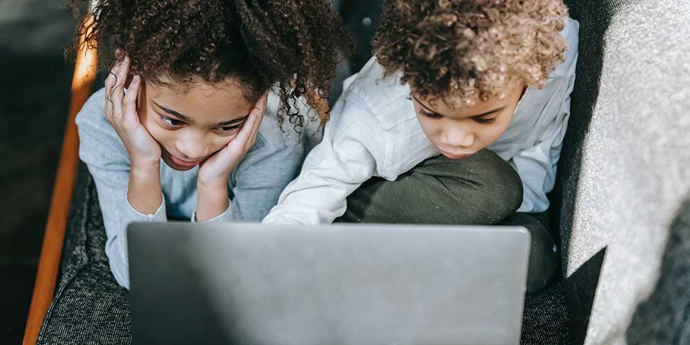two children using the internet