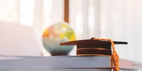 university cap and globe