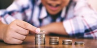 child counting money