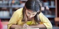 girl studying in library