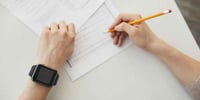 student writing easiest a level exam