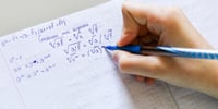 Student doing GCSE maths past paper