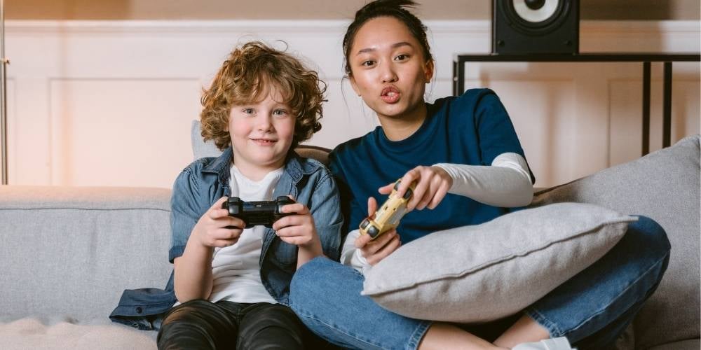 mother son playing esports videogames