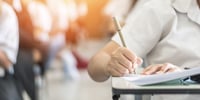 child taking 11+ test