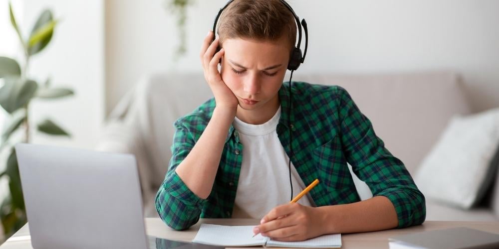 boy studying for a levels