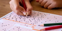 child taking test