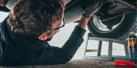 teenager doing mechanic apprenticeship