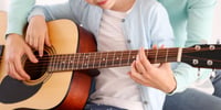 child playing guitar