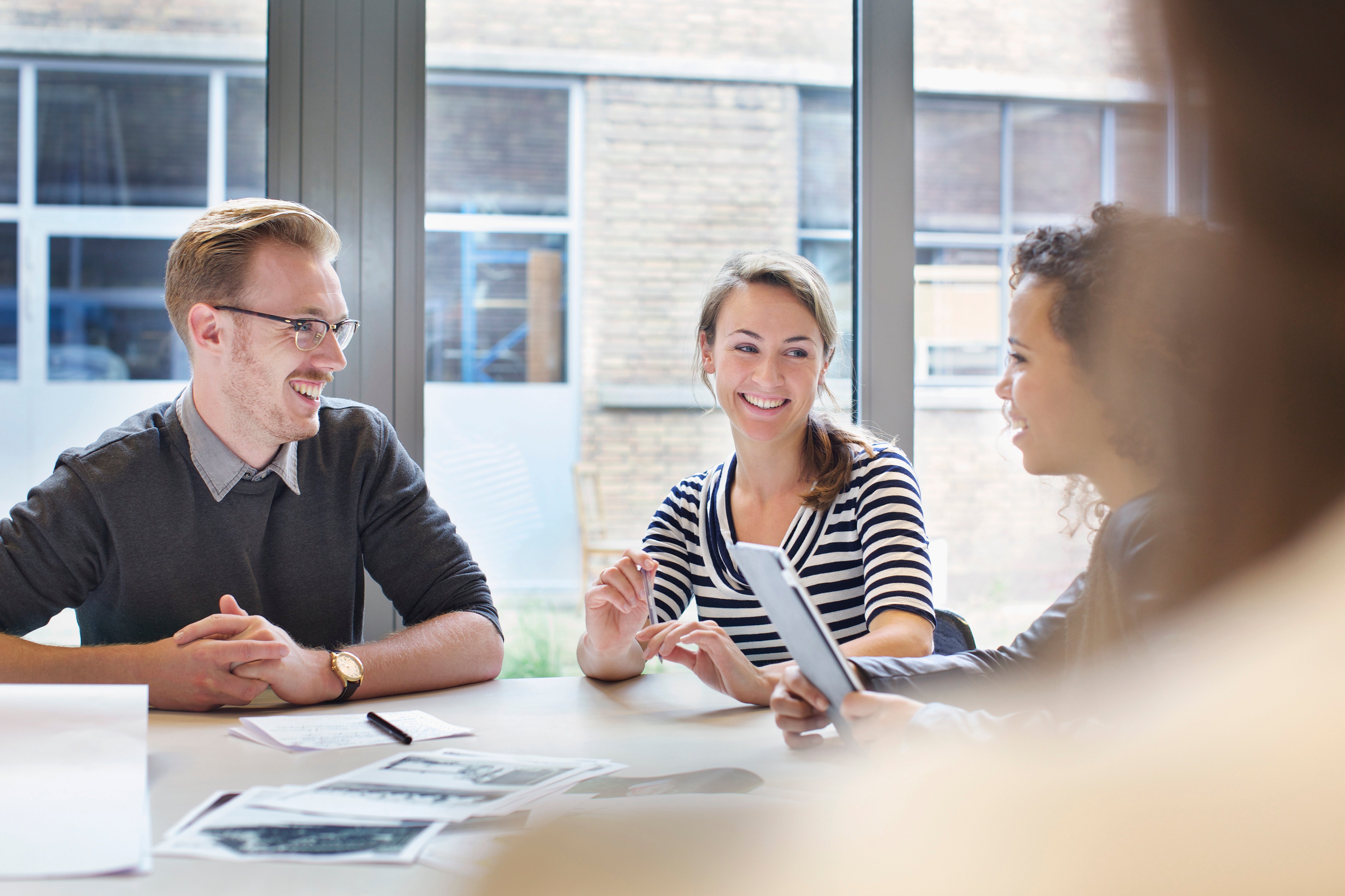 design-team-meeting-at-conference-table-in-creativ-2024-10-20-09-57-51-utc