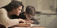 mother and son doing homeschooling