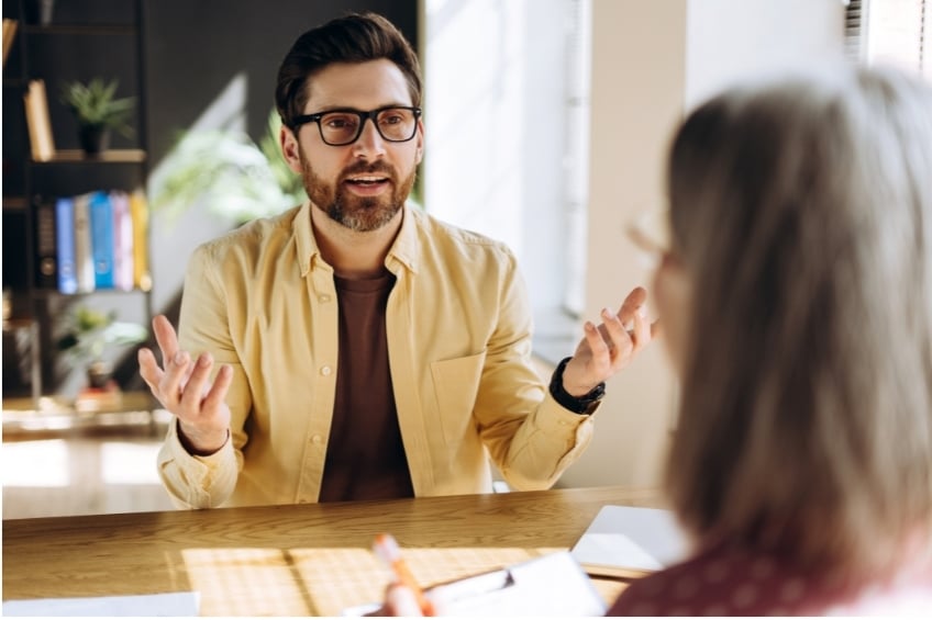 male teacher giving education and lesson-plan consulting advice