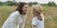 mum talking to daughter