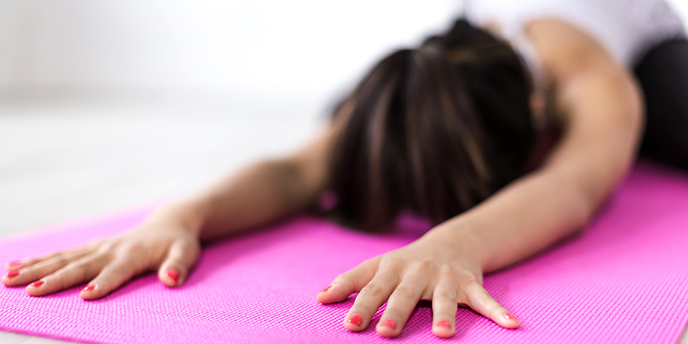 child doing yoga