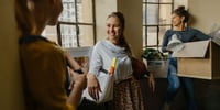 girls moving into student dorm