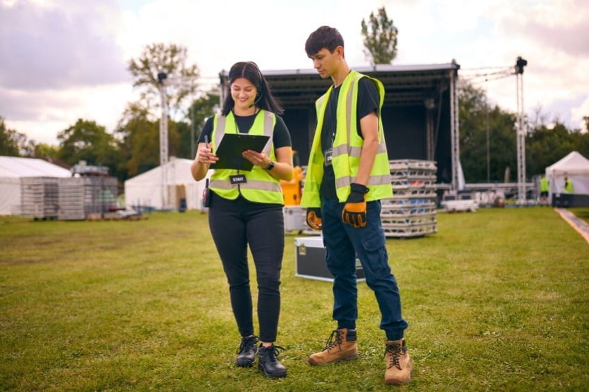 student-summer-job-as-festival-crew-wearing-high-vis-vests
