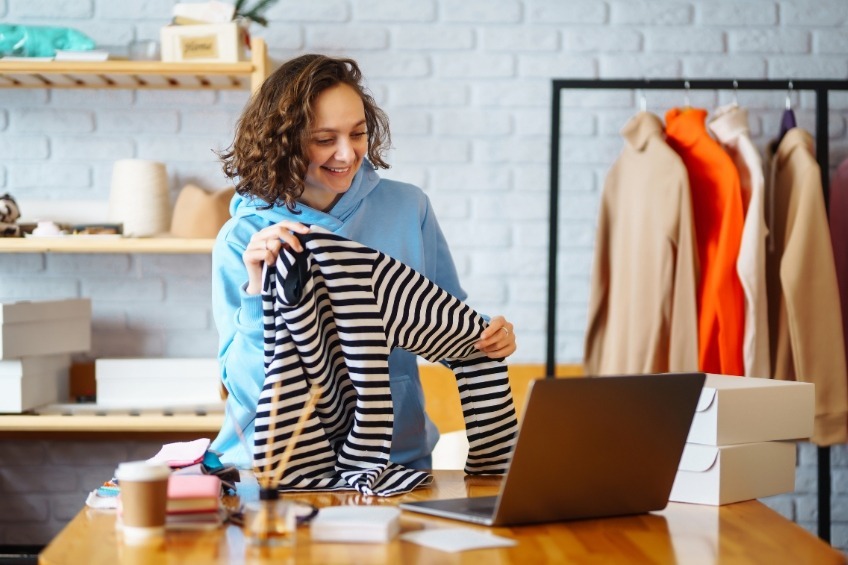 student-summer-job-reselling-striped-clothing-for-an-online-shop