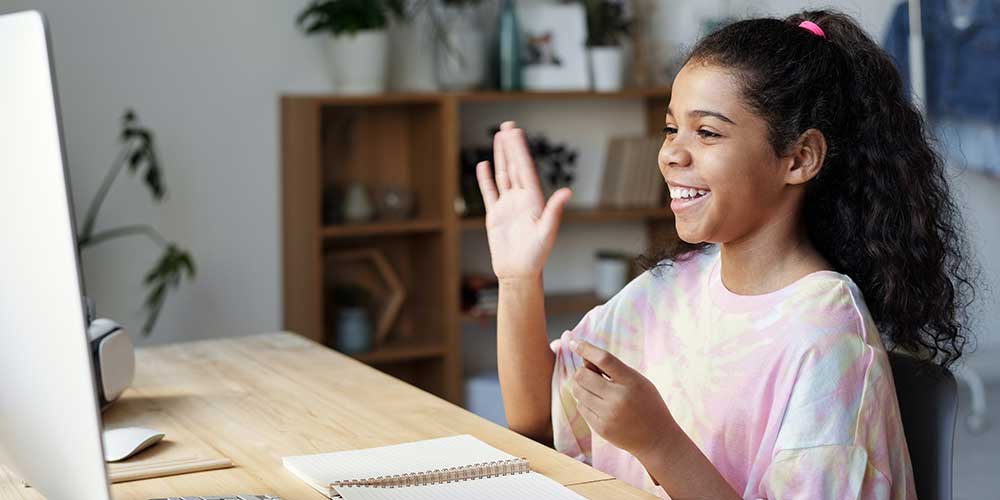 girl taking online lesson