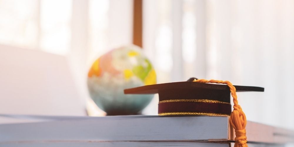 university cap and globe