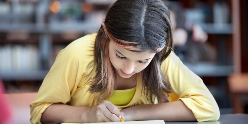 girl studying in library