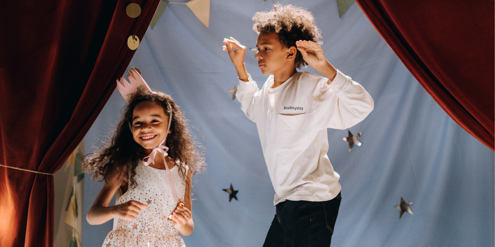 kids playing on a stage