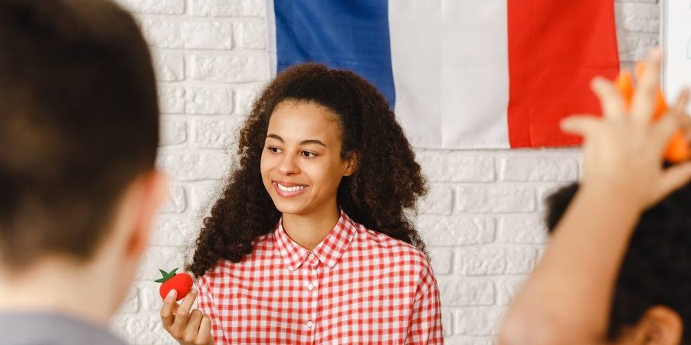 girl in front of french flag