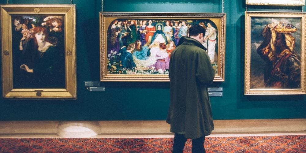 man in art museum