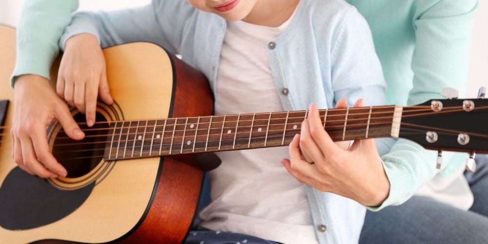 child playing guitar