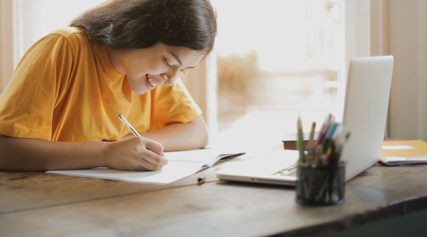 girl writing a personal statement