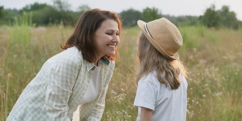 mum talking to daughter
